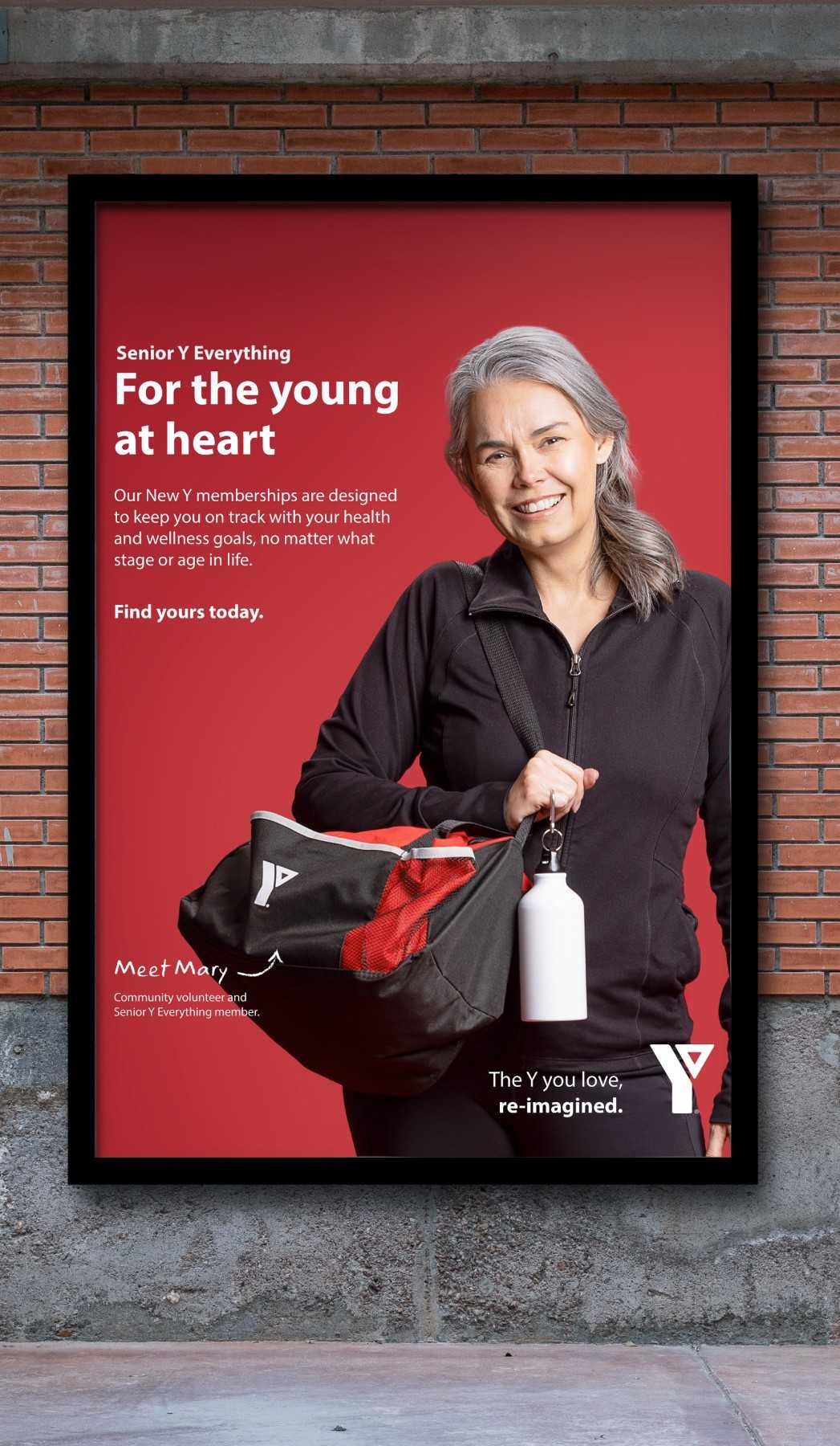 a billboard with ad for the YMCA with an older woman
